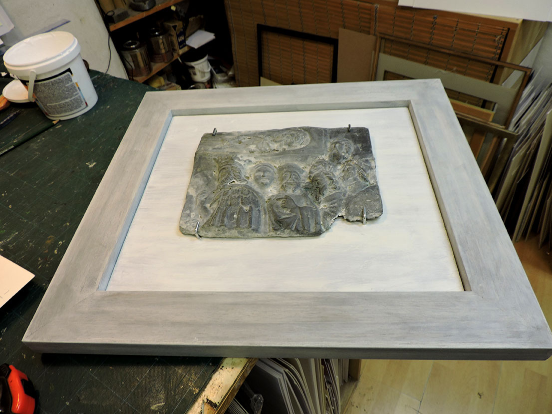 Uokviren olovni odljev